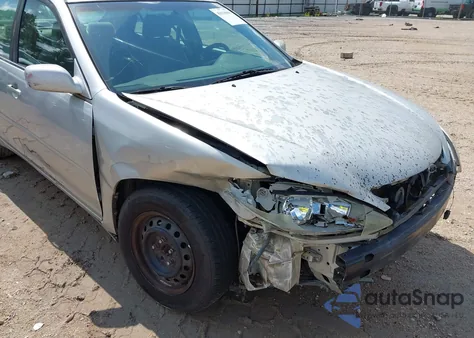 2002 Toyota Camry Le from USA, damaged, VIN 4T1BE32K82U595200